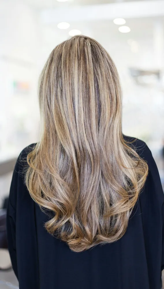 Long blonde hair with soft dimension, seen from the back